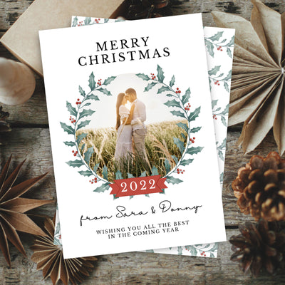 merry christmas photo card with persoanlized text and holly wreath